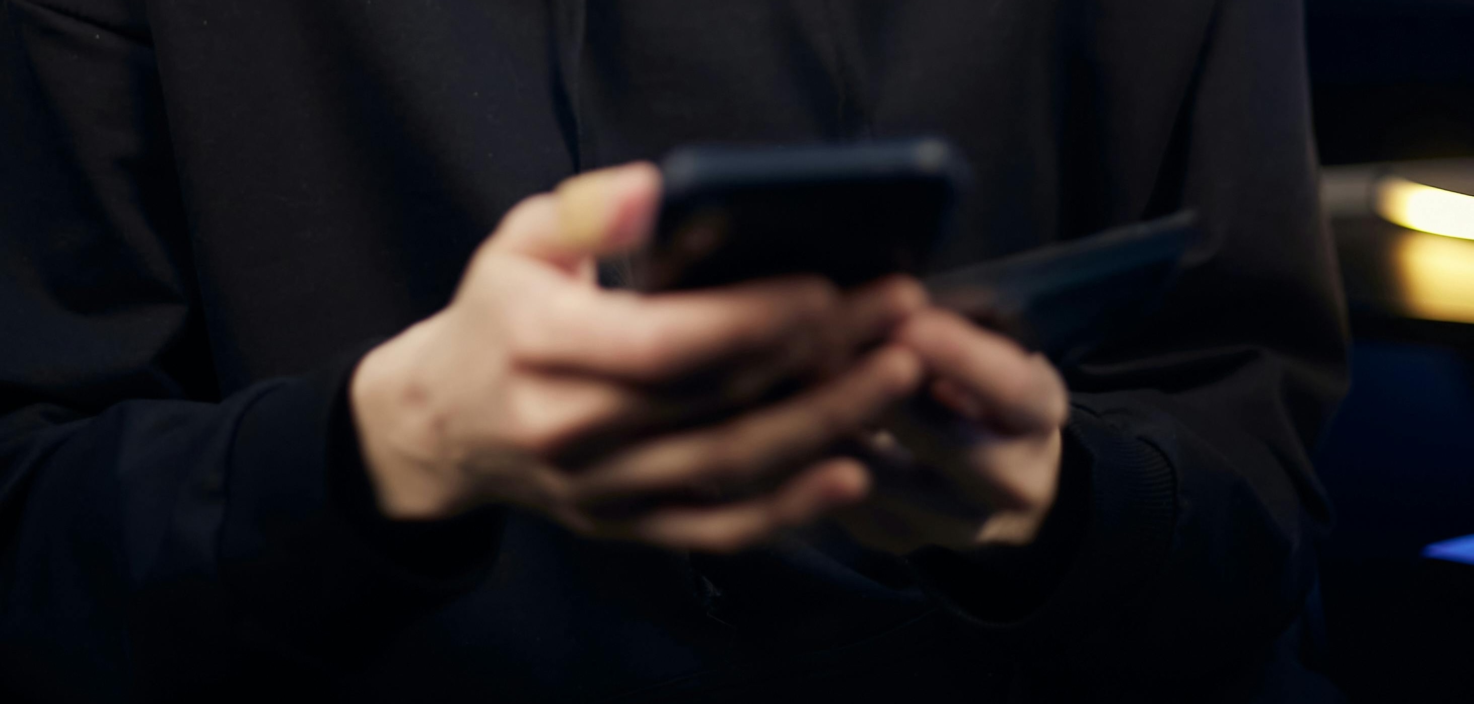 Person holding smartphone